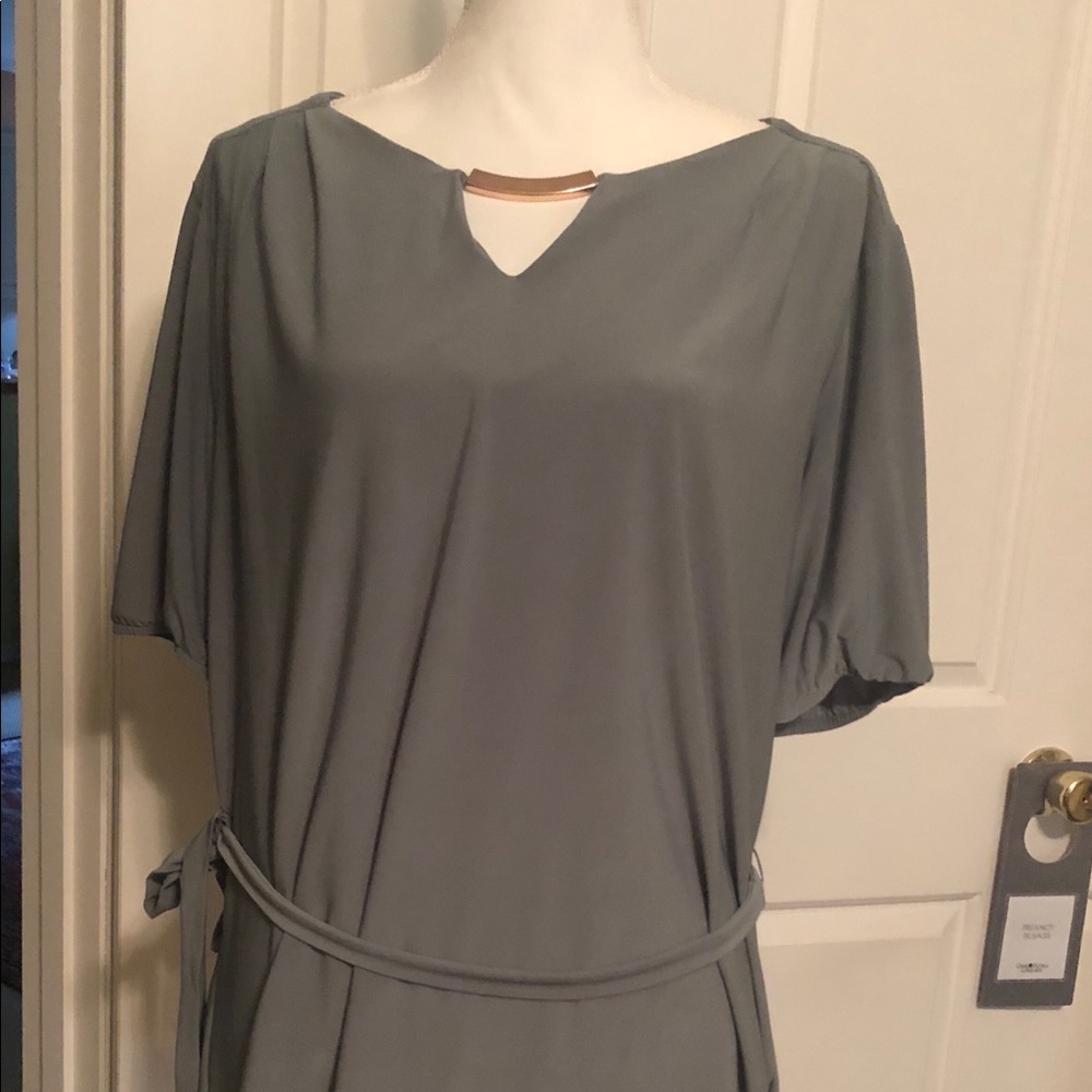 Green shirt with gold bar neckline